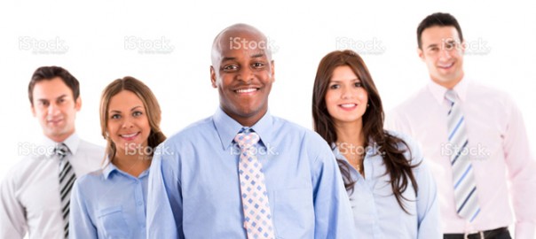 Smiling diverse business team in blue shirts