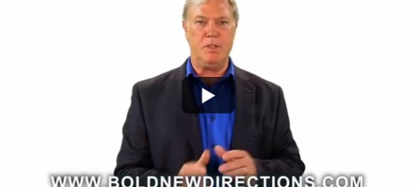 Presenter in blue shirt with website text