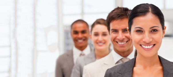 Smiling diverse professional team lined up