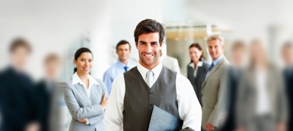 Smiling businessman leading a professional team