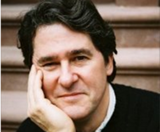 Middle-aged man smiling with hand on cheek